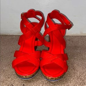 Orange wedged heels